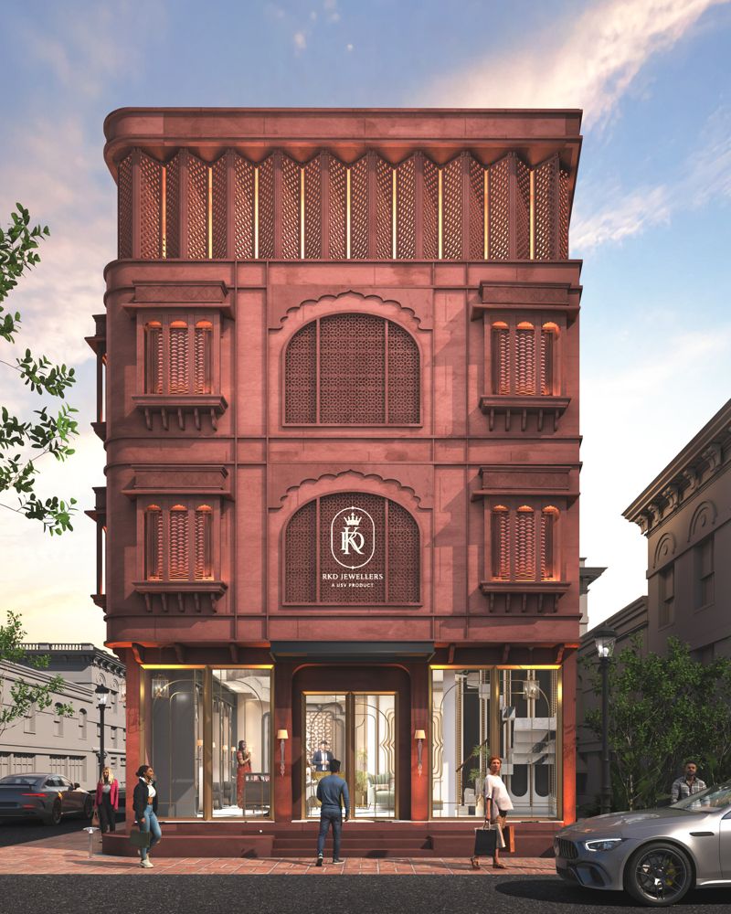 The Heritage: red sandstone jewellery showroom façade with jali screens and arched windows